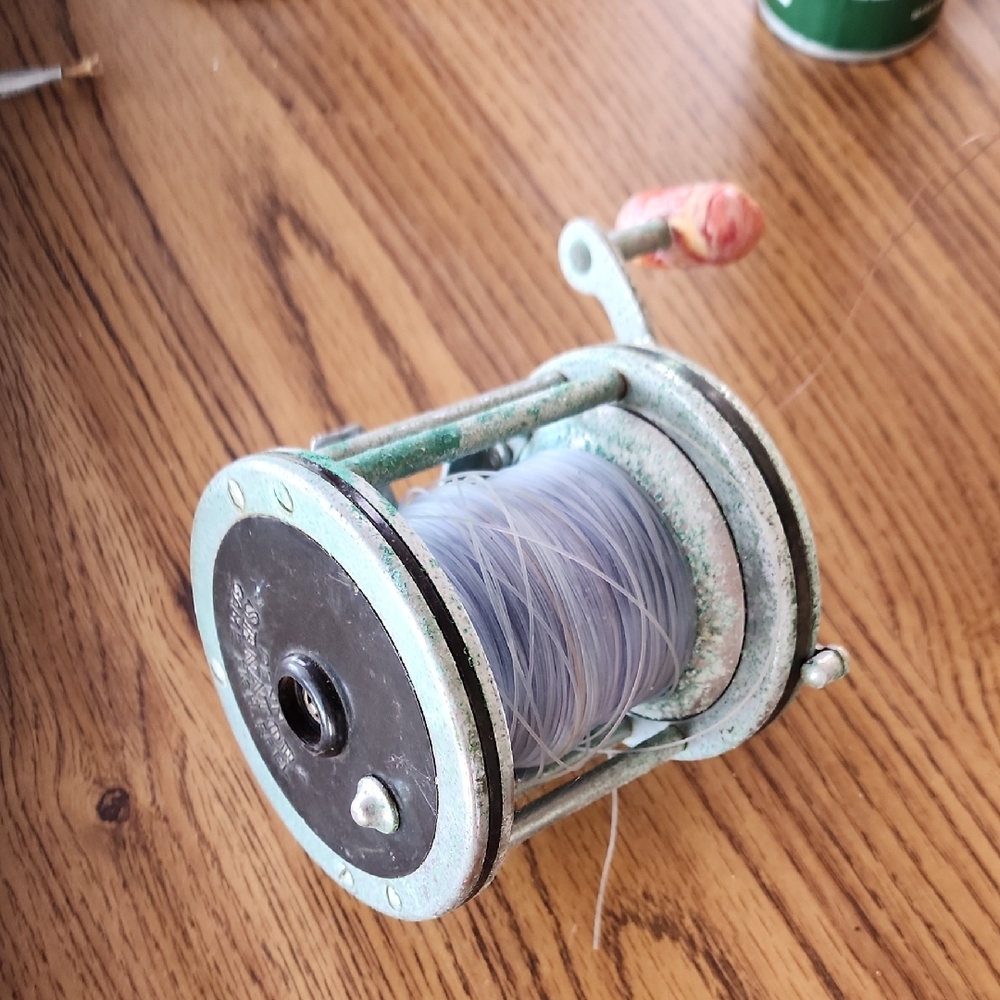 Vintage Fishing Reel with Line